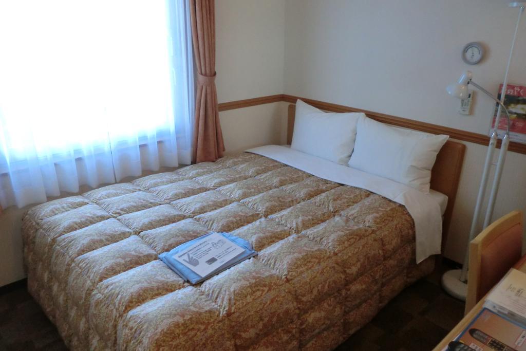 Toyoko Inn Hokkaido Sapporo-Eki Nishi-Guchi Hokudai Mae Exterior photo