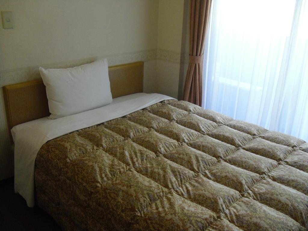 Toyoko Inn Hokkaido Sapporo-Eki Nishi-Guchi Hokudai Mae Exterior photo